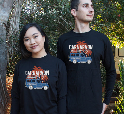 Male and Female in a garden wearing Black Long Sleeve T Shirt.  Graphic of a Troop Carrier vehicle with Palm Trees.  Text reads Carnarvon, Western Australia Camp Responsibly.