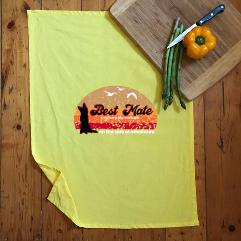 Yellow Tea Towel with graphic design of a silhouette of a kelpie dog with the text Best Mate on the Side of Adventure