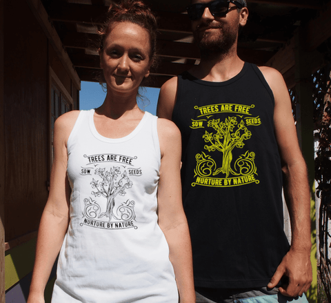 Singlet Tank style  T Shirt. Female in white singlet the design in black. Male in black singlet, the design is in yellow. Graphic of an outline of a tree with the text Trees are Free, Sow Seeds, Nurture by Nature.