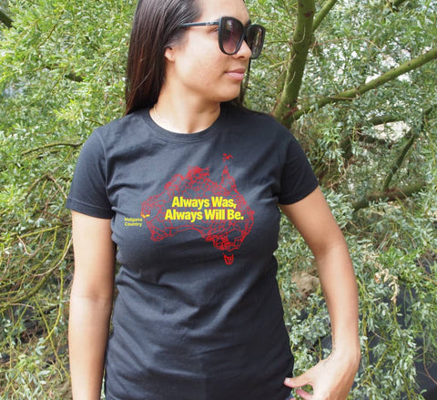 Female wearing a fitted short sleeve black t shirt.  Grpahic is a map of Australia with the tribal boundaries in red.  There is a text overlay in yellow that reads Always Was Always Will Be.  Malgana Country is highlighted.