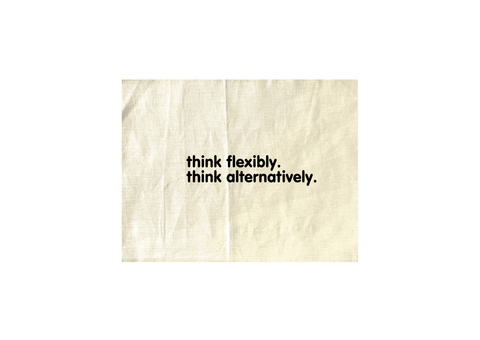 Natural Colour Tea Towel.  Design in black.  Graphic of two statements.  Think flexibly, Think alternatively.