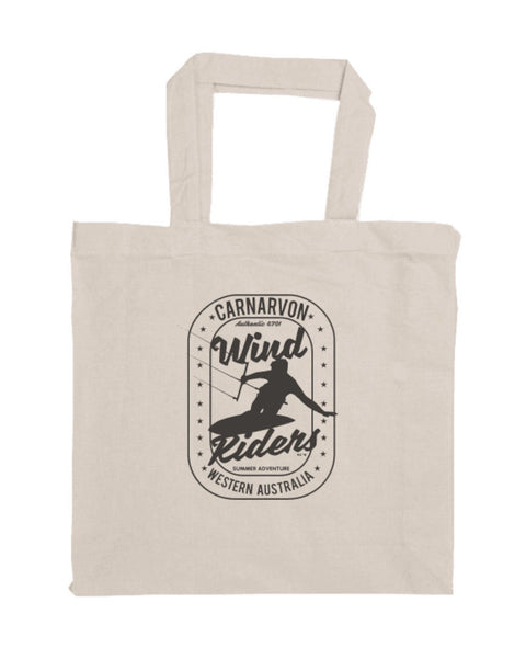 Short Handle Shopper Style Calico Bag, natural colour.  Design is in black.  The graphics are of a silhouette of a kite surfer with the text Wind Riders, Carnarvon Western Australia,