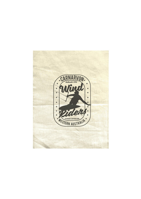 Natural Colour Tea Towel.  Design is in black.  The graphics are of a silhouette of a kite surfer with the text Wind Riders, Carnarvon Western Australia,