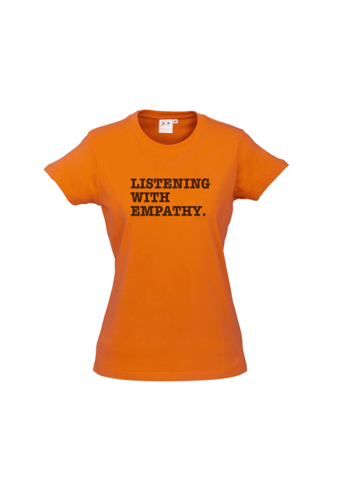 Orange Fitted Short Sleeve T Shirt. Graphic is stacked words in black. The text reads Listening with Empathy.