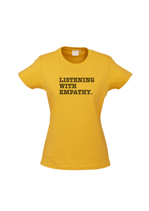 Golden Yellow Fitted Short Sleeve T Shirt. Graphic is stacked words in black. The text reads Listening with Empathy.