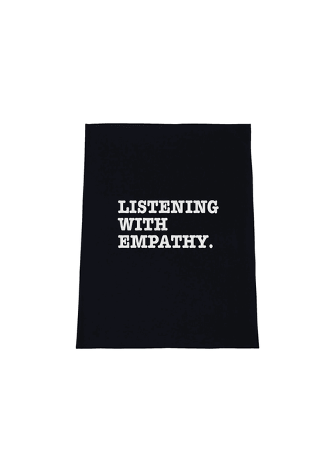 Black Tea Towel. Graphic is stacked words in white. The text reads Listening with Empathy.