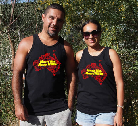 Male and Female wearing  Black Singlet T - shirt - with graphic - of australia map in traditional boundaries - in red.  Overtop of the map are the words Always Was Always Will Be, written in yellow.