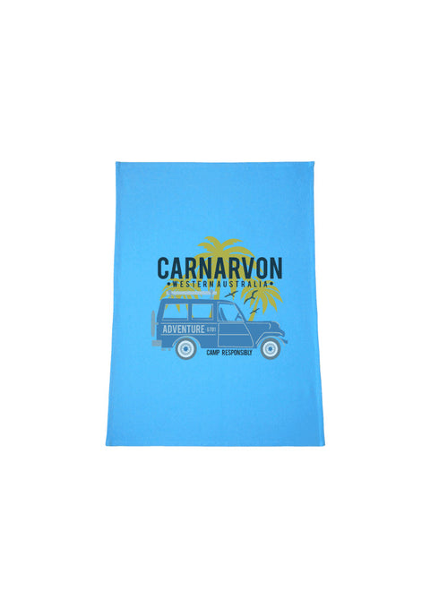 Light Blue Tea Towel.  Graphic of a Troop Carrier vehicle with Palm Trees.  Text reads Carnarvon, Western Australia Camp Responsibly.