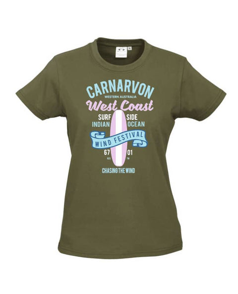 Khaki fitted Short Sleeve T Shirt. Design in blue and pink. Surfboard with banner saying Wind Festival. Text reads Carnarvon Western Australia. West Coast. Surf Side. Indian Ocean. 6701. Chasing the wind.